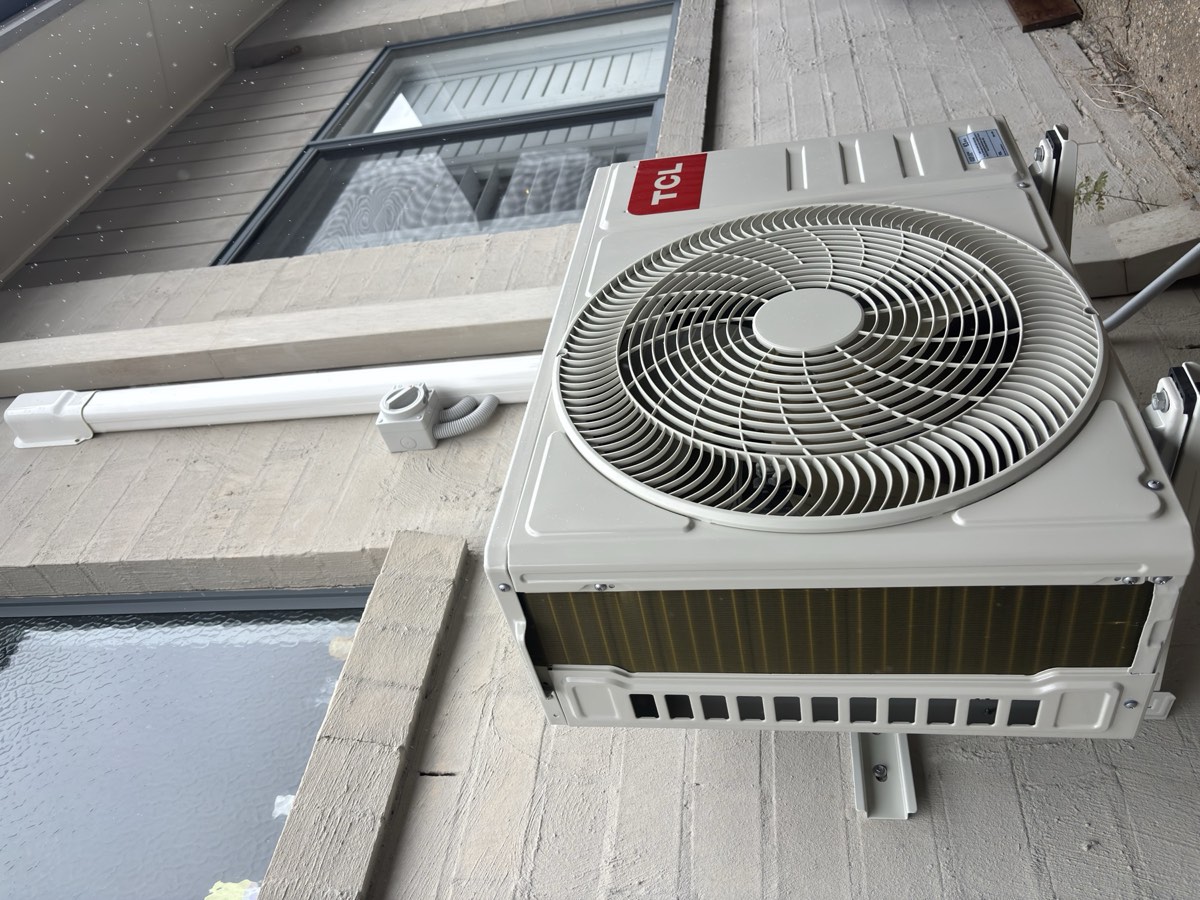 Outdoor air conditioning condenser installed on the Gold Coast