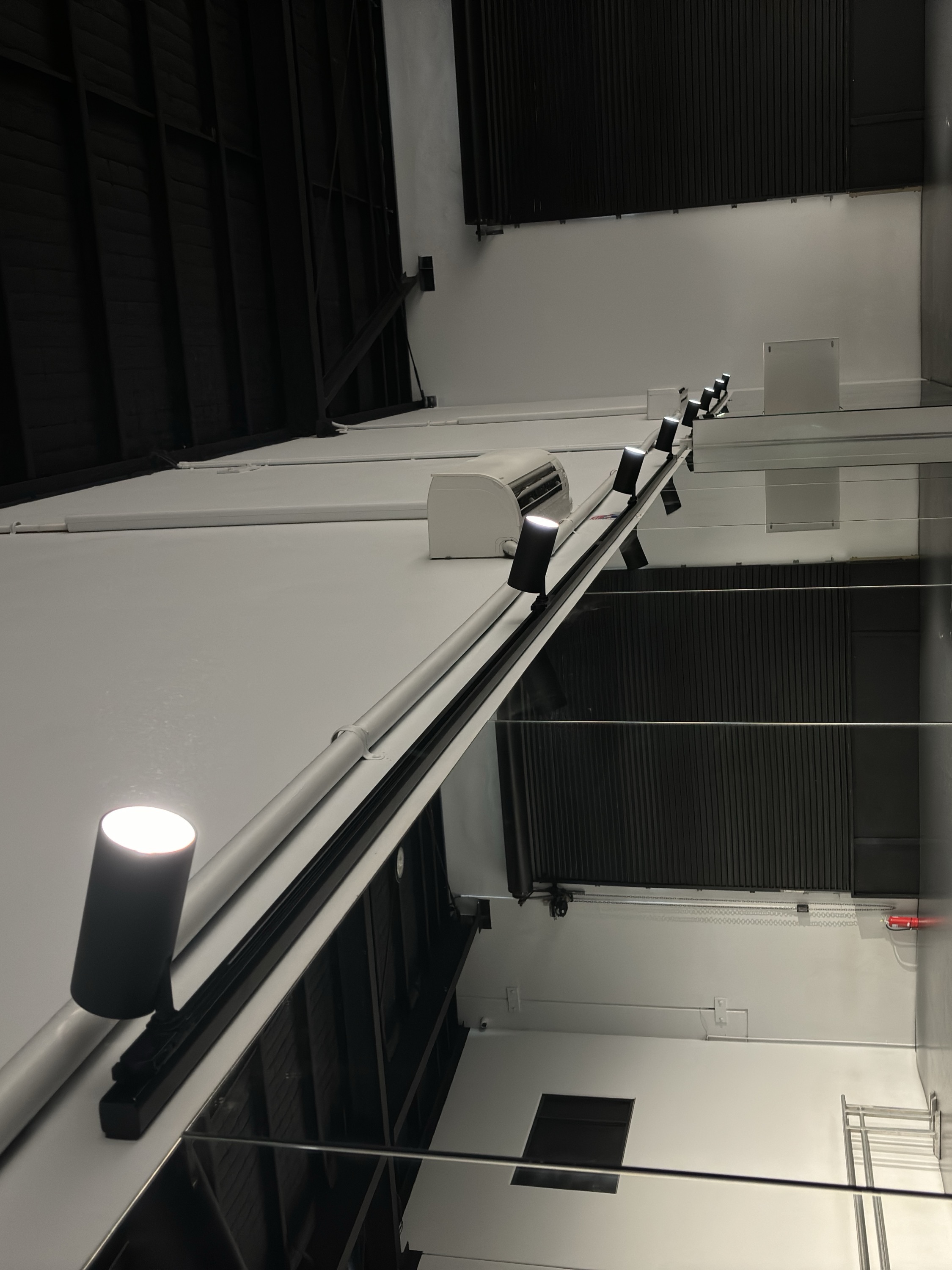 Track lighting and split system air conditioning installed in a Gold Coast commercial fit-out by Sparkez Electrical