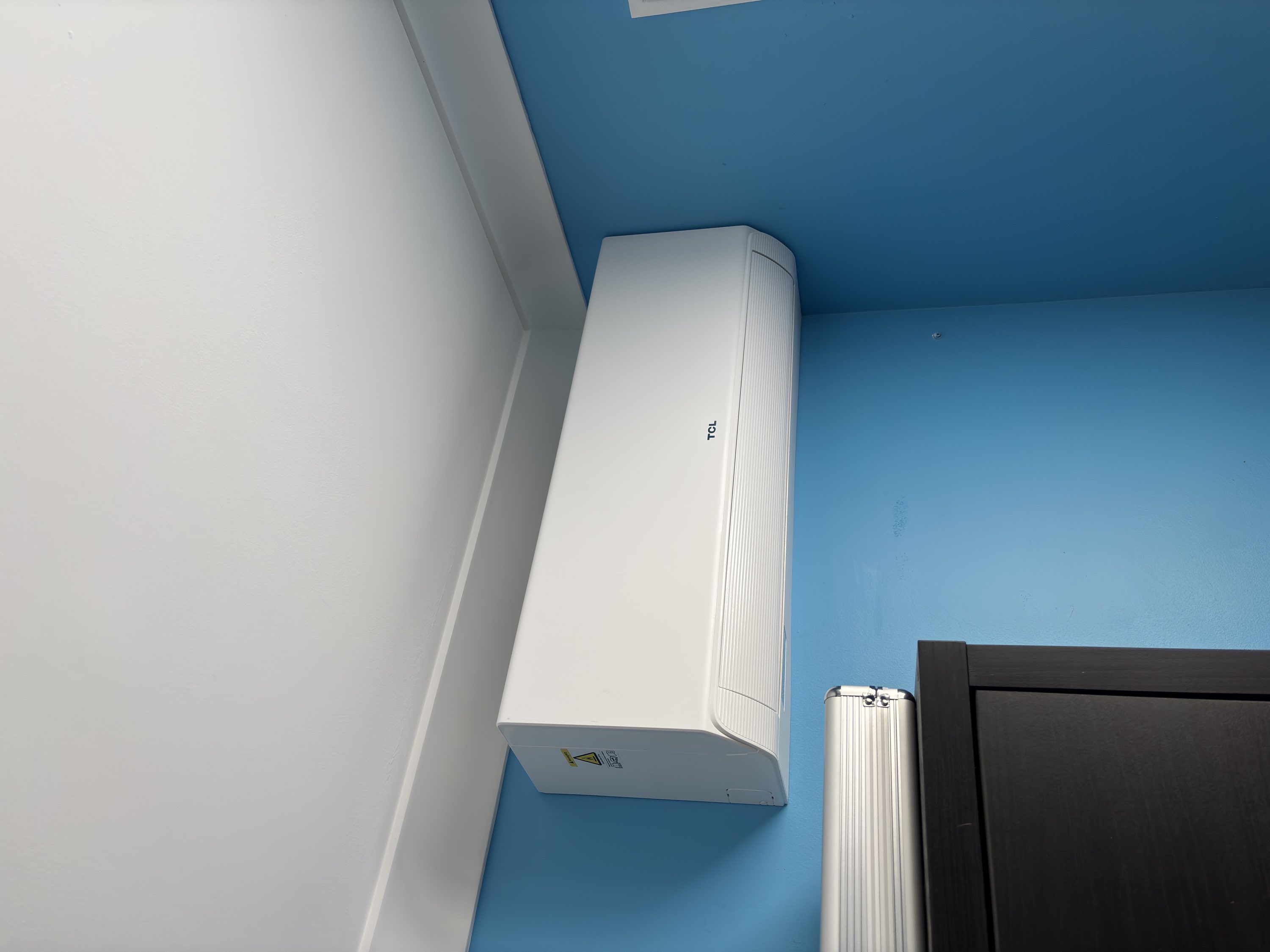 Split system air conditioner installed in a Gold Coast home by Sparkez Electrical